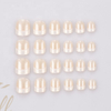 The latest trend is pale orange French artificial nails